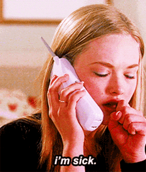 A girl on the phone faking a cough and saying "I'm sick". 